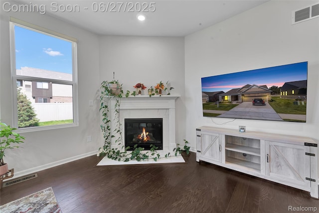 38731 Chasewood Ct, Farmington Hills, MI 48335 - living room with a fireplace with flush hearth, dark wood finished floors, and recessed lighting