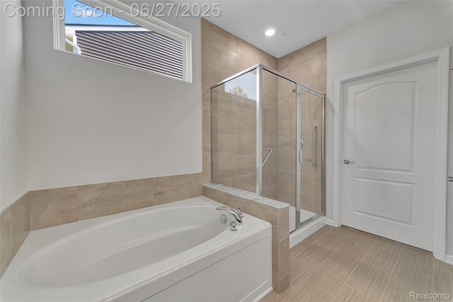 38731 Chasewood Ct, Farmington Hills, MI 48335 - full bathroom featuring a garden tub, plenty of natural light, a stall shower, and recessed lighting
