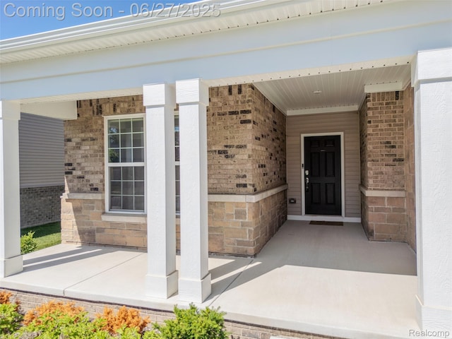 38731 Chasewood Ct, Farmington Hills, MI 48335 - view of exterior entry featuring brick siding