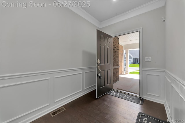 38731 Chasewood Ct, Farmington Hills, MI 48335 - foyer entrance featuring ornamental molding, a decorative wall, dark wood-type flooring, and wainscoting