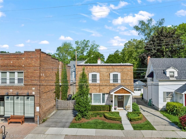 389 Kercheval Ave, Grosse Pointe, MI 48236 - view of front facade featuring brick siding