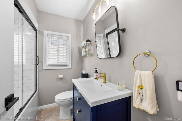 389 Kercheval Ave, Grosse Pointe, MI 48236 - bathroom featuring vanity and combined bath / shower with glass door