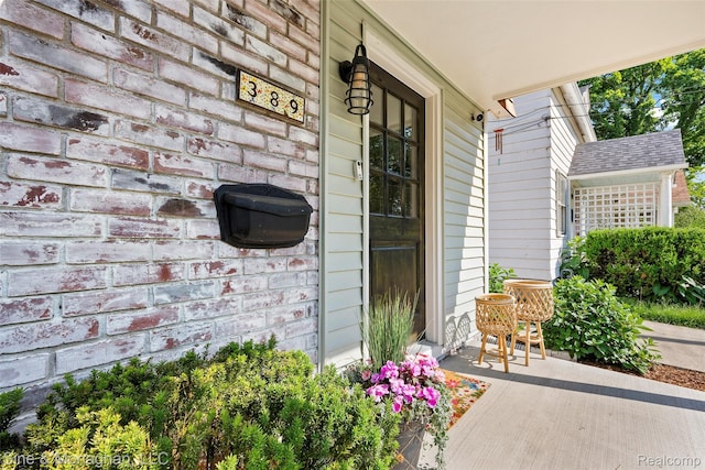 389 Kercheval Ave, Grosse Pointe, MI 48236 - doorway to property featuring a porch