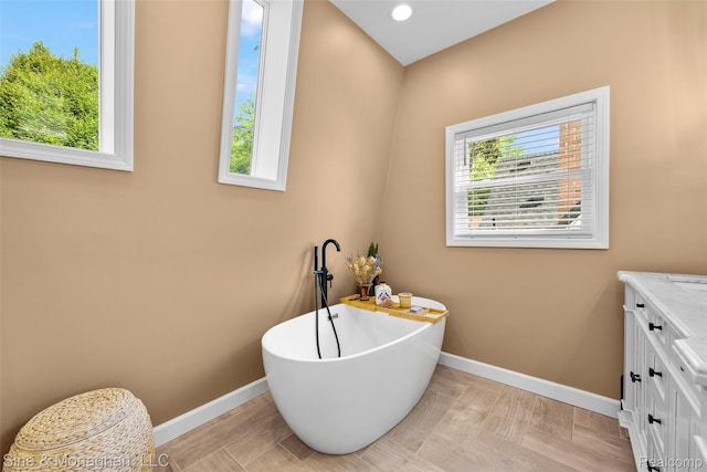 389 Kercheval Ave, Grosse Pointe, MI 48236 - full bath featuring a soaking tub and vanity