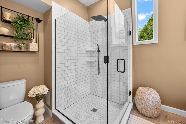 389 Kercheval Ave, Grosse Pointe, MI 48236 - full bath featuring a stall shower and wood finished floors