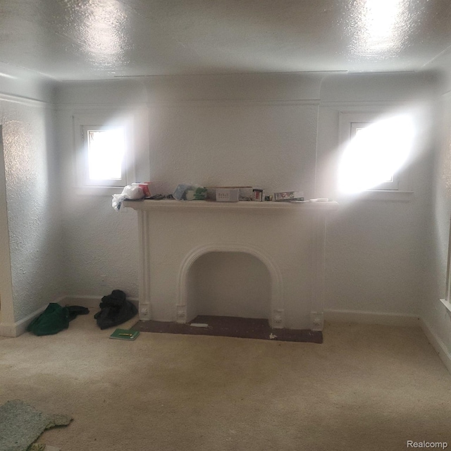 8229 Carlin St, Detroit, MI 48228 - unfurnished living room featuring light carpet