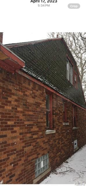 8229 Carlin St, Detroit, MI 48228 - view of property exterior featuring brick siding