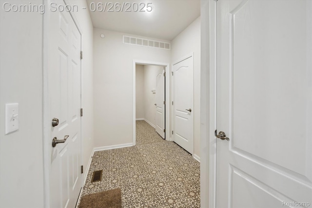 1065 Spring Trail Ct, Brighton, MI 48116 - corridor with baseboards and light flooring