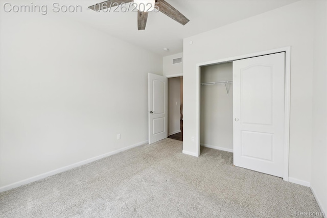 1065 Spring Trail Ct, Brighton, MI 48116 - unfurnished bedroom featuring carpet flooring, a closet, and ceiling fan