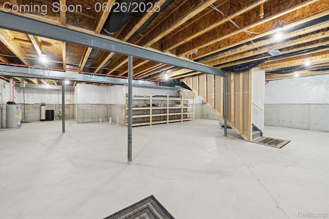 1065 Spring Trail Ct, Brighton, MI 48116 - unfinished basement featuring stairway, water heater, and a water softener