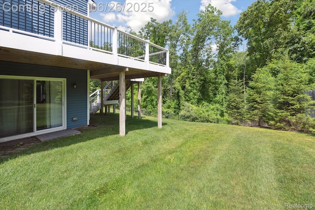 1065 Spring Trail Ct, Brighton, MI 48116 - view of grassy yard featuring a deck and stairs