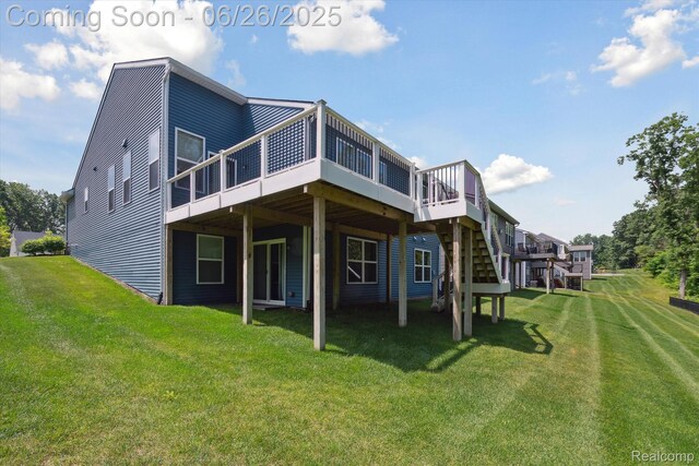 1065 Spring Trail Ct, Brighton, MI 48116 - back of house with a wooden deck and a yard