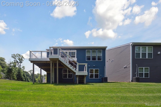 1065 Spring Trail Ct, Brighton, MI 48116 - rear view of house featuring a deck, stairs, and a yard