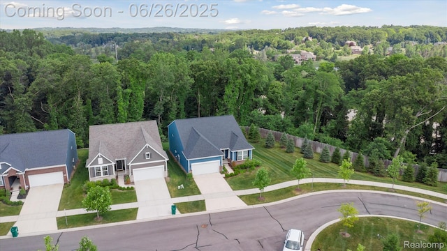 1065 Spring Trail Ct, Brighton, MI 48116 - drone / aerial view of a heavily wooded area