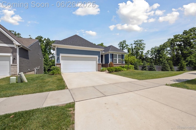 1065 Spring Trail Ct, Brighton, MI 48116 - ranch-style home featuring a front yard, an attached garage, brick siding, and driveway