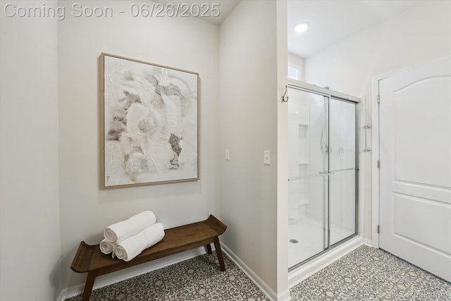 1065 Spring Trail Ct, Brighton, MI 48116 - bathroom featuring a stall shower and tile patterned floors