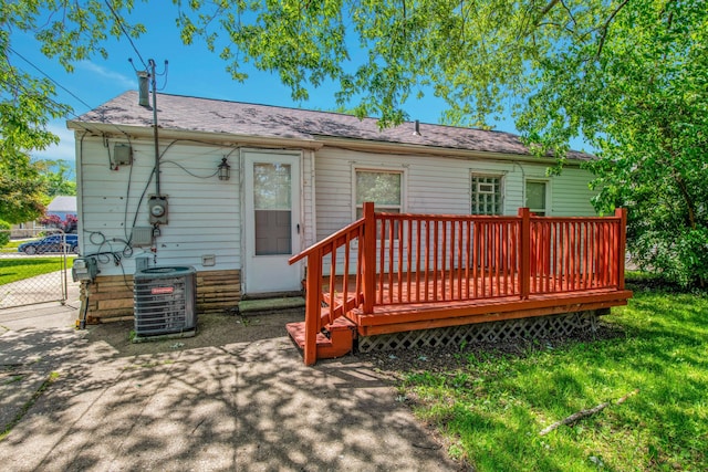 25294 Wiseman St, Roseville, MI 48066 - rear view of house with a wooden deck
