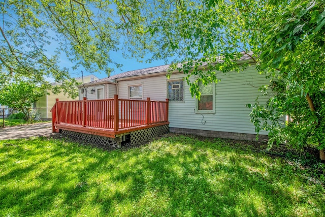 25294 Wiseman St, Roseville, MI 48066 - rear view of property featuring a yard and a wooden deck