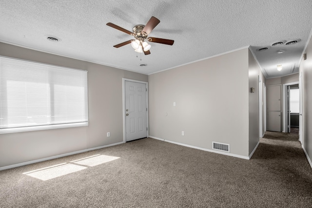 25294 Wiseman St, Roseville, MI 48066 - carpeted empty room with ceiling fan, ornamental molding, a textured ceiling, and attic access