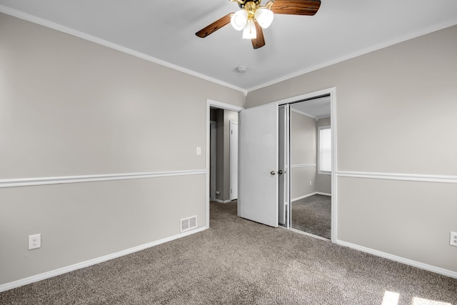 25294 Wiseman St, Roseville, MI 48066 - unfurnished bedroom featuring carpet floors, crown molding, a closet, and a ceiling fan