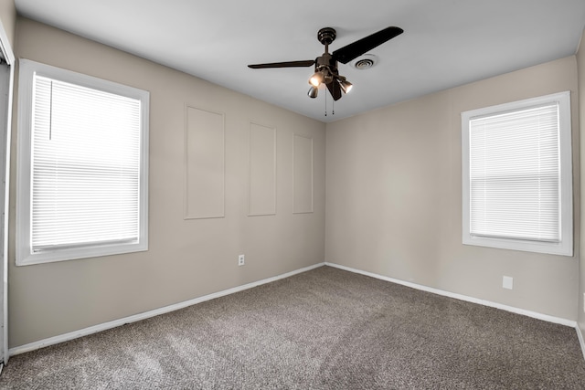 25294 Wiseman St, Roseville, MI 48066 - unfurnished room with carpet and a ceiling fan
