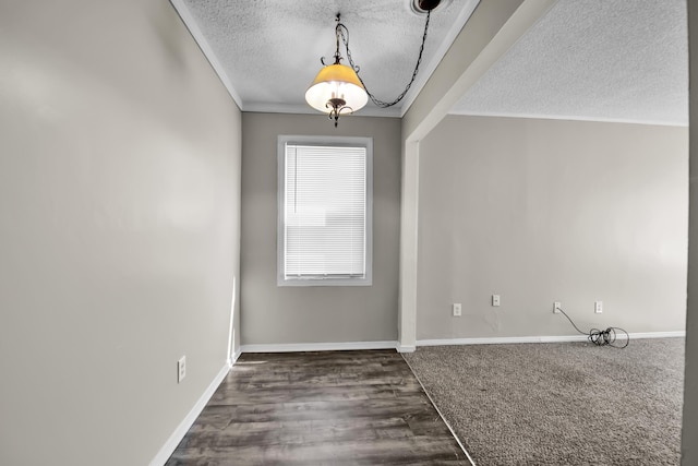 25294 Wiseman St, Roseville, MI 48066 - empty room featuring a textured ceiling, ornamental molding, and wood finished floors