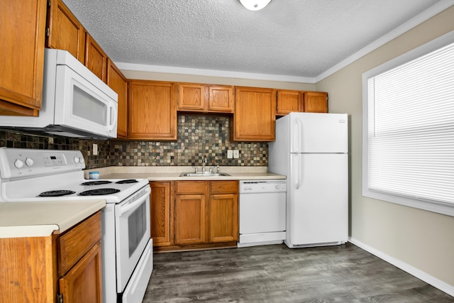 25294 Wiseman St, Roseville, MI 48066 - kitchen featuring white appliances, light countertops, backsplash, a textured ceiling, and dark wood finished floors