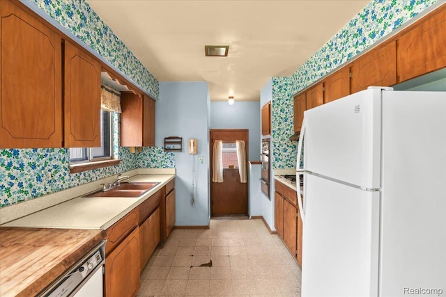 4663 Marian Ave, Warren, MI 48092 - kitchen with appliances with stainless steel finishes and brown cabinetry