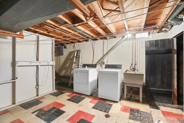 4663 Marian Ave, Warren, MI 48092 - washroom featuring tile patterned floors, independent washer and dryer, and electric panel