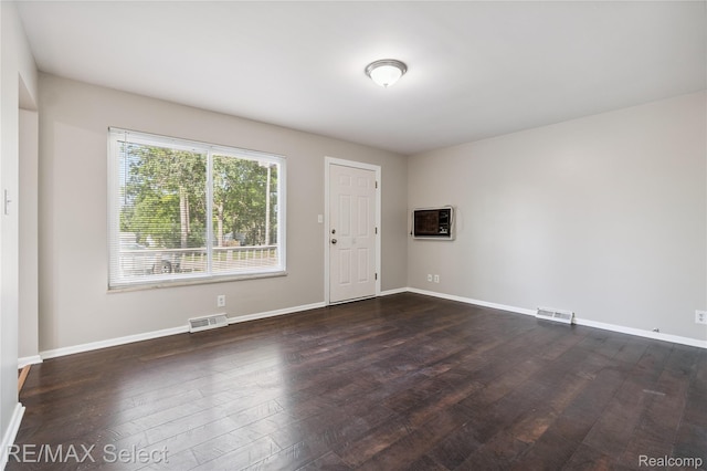 3062 Walton Ave, Davison, MI 48504 - empty room with wood finished floors and baseboards