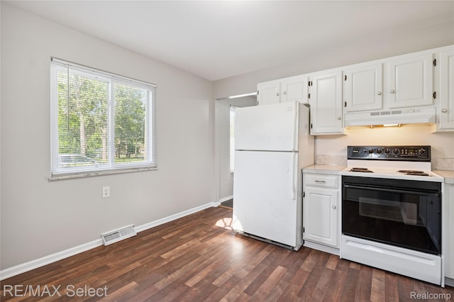 3062 Walton Ave, Davison, MI 48504 - kitchen featuring electric stove, under cabinet range hood, freestanding refrigerator, dark wood-type flooring, and light countertops