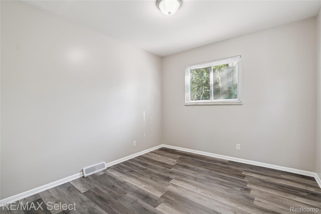 3062 Walton Ave, Davison, MI 48504 - spare room featuring dark wood finished floors