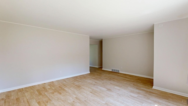 7106 Partridge Dr, Flushing, MI 48433 - unfurnished room featuring light wood finished floors and baseboards