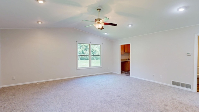 7106 Partridge Dr, Flushing, MI 48433 - unfurnished room with ceiling fan, carpet, vaulted ceiling, and recessed lighting