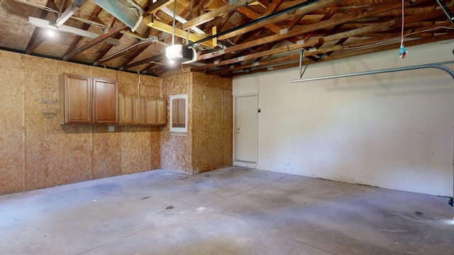 7106 Partridge Dr, Flushing, MI 48433 - garage featuring a garage door opener