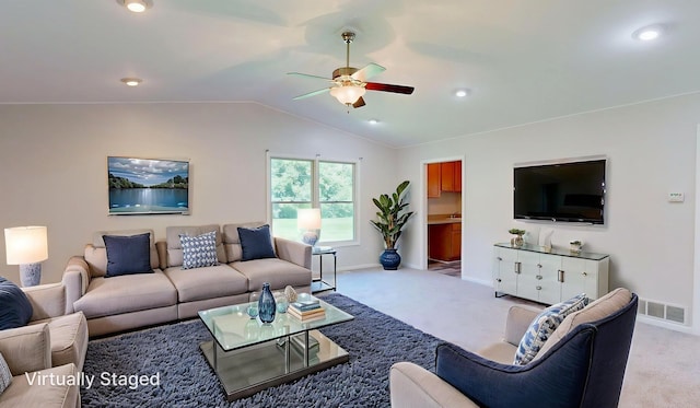 7106 Partridge Dr, Flushing, MI 48433 - carpeted living area featuring ceiling fan, lofted ceiling, and recessed lighting