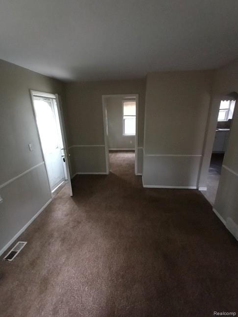 15989 Dalby, Redford, MI 48239 - unfurnished living room featuring healthy amount of natural light and carpet flooring