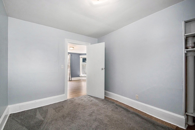 814 12th St NW, Grand Rapids, MI 49504 - spare room with carpet and baseboards