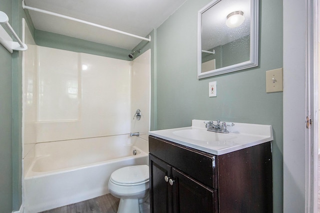 814 12th St NW, Grand Rapids, MI 49504 - bathroom featuring vanity, wood finished floors, and bathing tub / shower combination