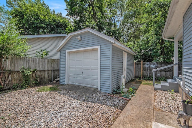 814 12th St NW, Grand Rapids, MI 49504 - detached garage featuring driveway