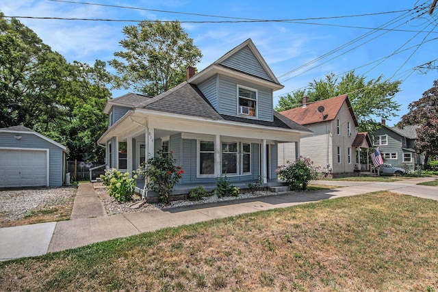 814 12th St NW, Grand Rapids, MI 49504 - bungalow-style home featuring covered porch, a chimney, an outbuilding, a shingled roof, and a garage