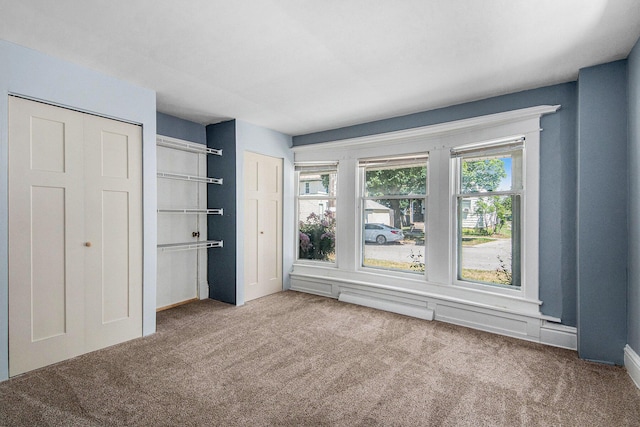 814 12th St NW, Grand Rapids, MI 49504 - unfurnished bedroom featuring carpet flooring