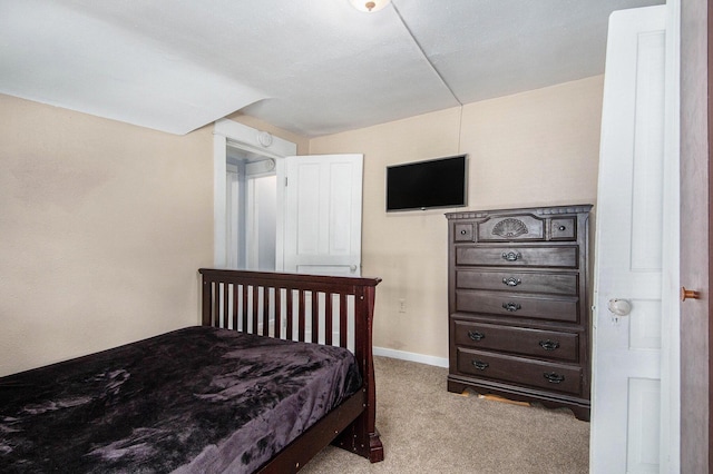 814 12th St NW, Grand Rapids, MI 49504 - carpeted bedroom with baseboards