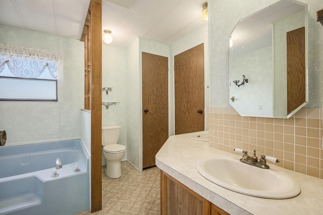 12963 E Englewright Dr, Sand Lake, MI 49343 - full bath featuring a bath, tile patterned floors, vanity, and backsplash