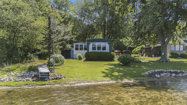 12963 E Englewright Dr, Sand Lake, MI 49343 - view of front of house with a front lawn
