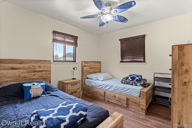 6426 Highview St, Dearborn Heights, MI 48127 - bedroom with wood finished floors and ceiling fan