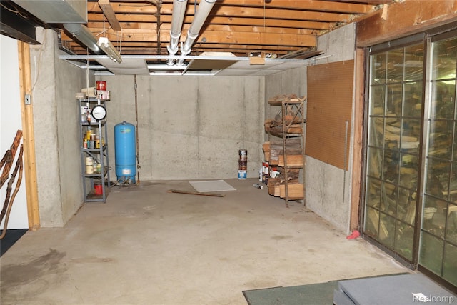320 Nancy Bird Ln, Clarkston, MI 48371 - unfinished basement featuring a water pressure tank