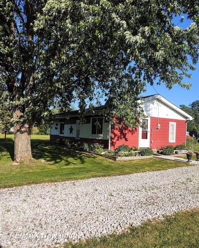 4230 E M-55, Prescott, MI 48756 - ranch-style home with a front yard
