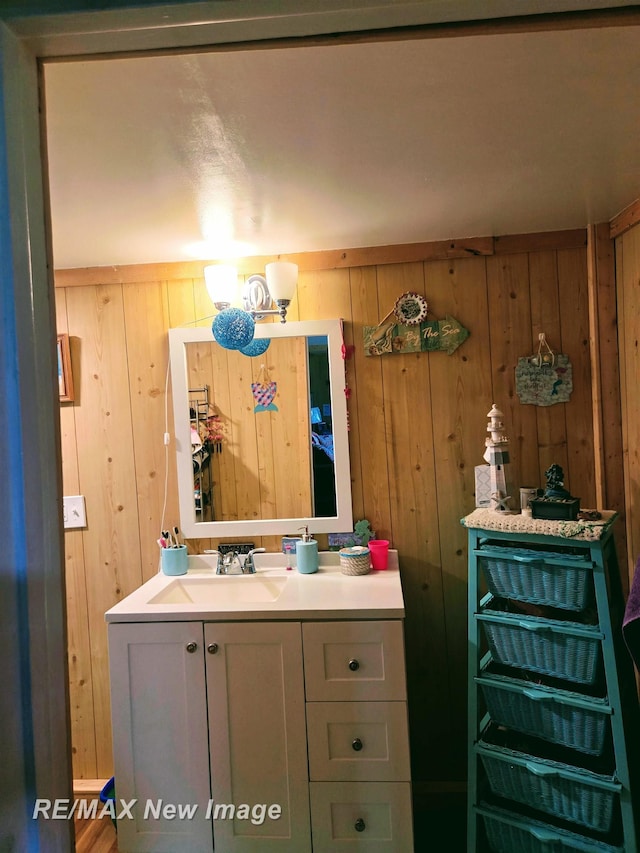 4230 E M-55, Prescott, MI 48756 - bathroom with wood walls, vanity, and a chandelier