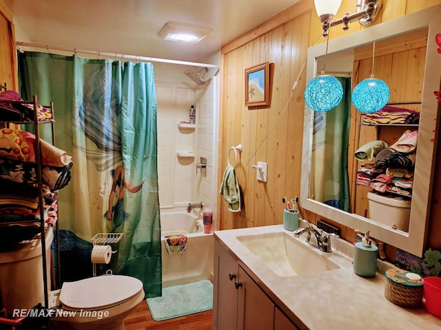 4230 E M-55, Prescott, MI 48756 - full bathroom with vanity, shower / bath combo, wooden walls, and wood finished floors